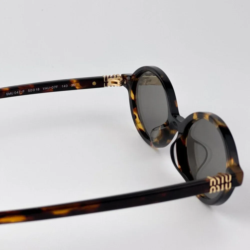 Miu Miu REGARD MU04ZSF Sunglasses – Havana Oval Grey Mirror Silver | Model VAU07